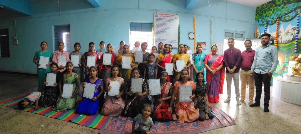 Women artisans receiving their training certificates